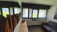 Posedenie v ubytovaní Appartamento condominio Ametista - La Thuile