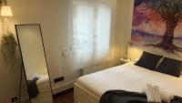 Postel nebo postele na pokoji v ubytování Vivienda Turística Urbana en Santuchu, Cómoda, Funcional y con Parking