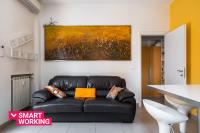 A seating area at Bergonzoni Modern Apartment by Wonderful Italy