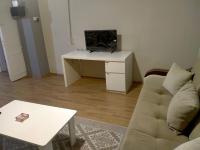 A television and/or entertainment centre at 2 bedrooms central area located appartment 1floor