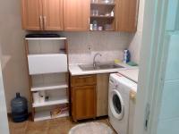 A kitchen or kitchenette at 2 bedrooms central area located appartment 1floor