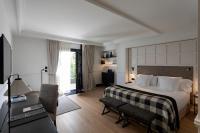 Łóżko lub łóżka w pokoju w obiekcie Hotel Villa Soro