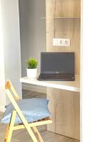 TV a/nebo společenská místnost v ubytování Apartamento con vistas al Mediterraneo