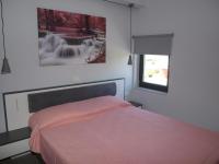 Posteľ alebo postele v izbe v ubytovaní Attic Apartments