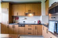Kuchyňa alebo kuchynka v ubytovaní Apartament Tatry55