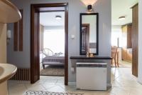 Posteľ alebo postele v izbe v ubytovaní Apartament Tatry55