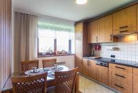 Kuchyňa alebo kuchynka v ubytovaní Apartament Tatry55