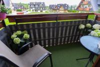 Posedenie v ubytovaní Apartament Tatry55