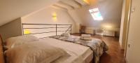 Posteľ alebo postele v izbe v ubytovaní House Stone house Skor