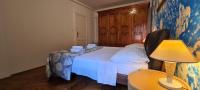 Posteľ alebo postele v izbe v ubytovaní House Stone house Skor