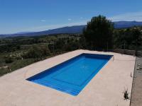Bazén v ubytování Habitaciones en Finca Olivo y Almendro nebo v jeho okolí