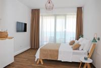 Posteľ alebo postele v izbe v ubytovaní Villa Seabatical