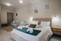 Posteľ alebo postele v izbe v ubytovaní Savere luxury studios