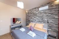 Postel nebo postele na pokoji v ubytování Olympia Villa