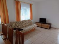 Telewizja i/lub zestaw kina domowego w obiekcie Flauta Apartamenty Rodzinne
