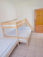 Łóżko lub łóżka w pokoju w obiekcie Flauta Apartamenty Rodzinne
