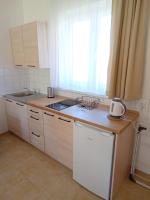 Kuchnia lub aneks kuchenny w obiekcie Flauta Apartamenty Rodzinne