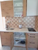 Kuchnia lub aneks kuchenny w obiekcie Flauta Apartamenty Rodzinne