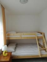 Łóżko lub łóżka w pokoju w obiekcie Flauta Apartamenty Rodzinne