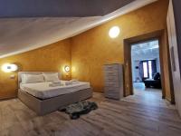 Posteľ alebo postele v izbe v ubytovaní Torino Vacancy San Tommaso Suite