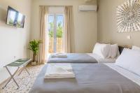 Posteľ alebo postele v izbe v ubytovaní Renaissance Apartment, feeling the heartbeat of Rethymno!