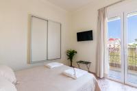 Posteľ alebo postele v izbe v ubytovaní Renaissance Apartment, feeling the heartbeat of Rethymno!