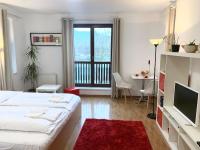 Postel nebo postele na pokoji v ubytování Aparthotel Faust