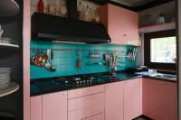 A kitchen or kitchenette at Villa Isidoro ampio parco ,piscina privata, arte e giochi , fitness