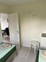 Postel nebo postele na pokoji v ubytování Feriehus med Sjøutsikt