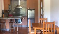 Kuchyň nebo kuchyňský kout v ubytování Apartamentos aDoniña Playa Major Sanxenxo