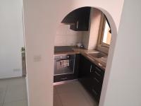 Kuchyň nebo kuchyňský kout v ubytování Seashell Apartments