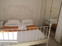 Postel nebo postele na pokoji v ubytování Seashell Apartments