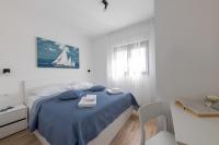 Posteľ alebo postele v izbe v ubytovaní Apartman Ivan & Marko