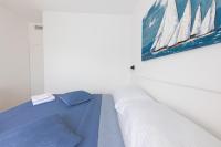 Posteľ alebo postele v izbe v ubytovaní Apartman Ivan & Marko