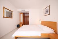 Łóżko lub łóżka w pokoju w obiekcie Depadansa Hotel Lucija***