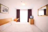 Łóżko lub łóżka w pokoju w obiekcie Depadansa Hotel Lucija***