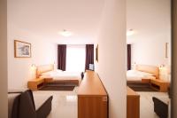 Łóżko lub łóżka w pokoju w obiekcie Depadansa Hotel Lucija***