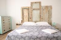 A bed or beds in a room at B&B DUE SORELLE