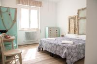 A bed or beds in a room at B&B DUE SORELLE