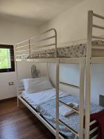 Posteľ alebo postele v izbe v ubytovaní La Casetta