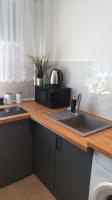 Kuchyňa alebo kuchynka v ubytovaní Apartament Wika