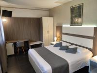 A bed or beds in a room at Therra Lodge