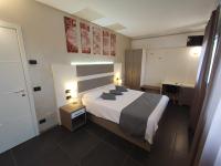 A bed or beds in a room at Therra Lodge