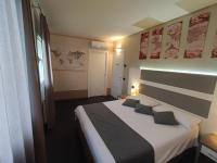 A bed or beds in a room at Therra Lodge