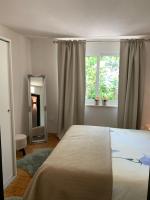 Posteľ alebo postele v izbe v ubytovaní Apartment Urban Oasis