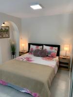 Posteľ alebo postele v izbe v ubytovaní Apartment Urban Oasis