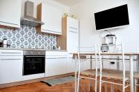 Kuchyňa alebo kuchynka v ubytovaní Apartments Viola Kampor