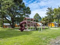 Ein Kinderspielbereich in der Unterkunft Beach Bum West-O Motel
