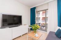Telewizja i/lub zestaw kina domowego w obiekcie Apartament 54 Old Town