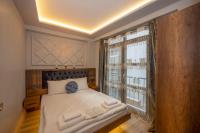 Postel nebo postele na pokoji v ubytování Dorne Suite Taksim Hotel